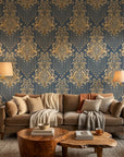 Sweet Pea Shadows gold and slate blue classic damask wallpaper in a warm and inviting living room