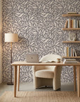 Swirling Echoes fluid foliage wallpaper as a feature wall in a bright home office