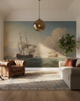 Maritime Tall Ships at Sea mural wallpaper featuring sailing vessels in muted blues and tans on living room wall