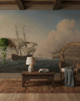 Tall Ships at Sea mural wallpaper depicting historic sailing vessels in soft blue and cream tones on living room wall