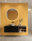 Tawny Rain golden brushstroke dash wallpaper creating ambiance in a serene bathroom