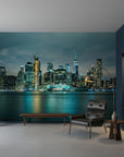 Teal Nocturne wallpaper mural featuring illuminated Manhattan skyline reflected in harbor waters at dusk