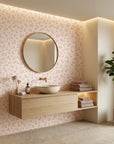 Tender Light soft blush floral sprig wallpaper creating ambiance in a serene bathroom