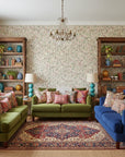 Thistle & Clover vintage botanical garden wallpaper in a warm and inviting living room