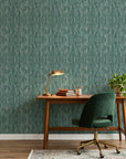 Tidal Grain green vertical woodgrain wallpaper as a feature wall in a bright home office