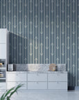 Blue-gray Tranquility Tapestry wallpaper with white arrow stripes in modern kitchen with marble countertops