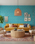 Tulip Tango bold turquoise and pink tulip wallpaper in a warm and inviting living room