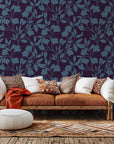 A deep violet wall covering adorned with a winding blue flower silhouette design, style name Twilight Bloom
