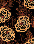 Self-adhesive wall covering featuring an outline design of black and orange flowers, part of the Twilight Garden collection.