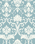 Elegant damask Twilight Garden Veil wallpaper in soft blue and cream featuring ornate baroque scrollwork pattern