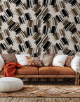 Black and beige abstract brushstroke pattern on peel-and-stick wallcovering