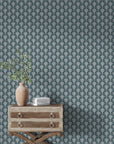Navy and sage Veiled Botany damask wallpaper with vintage styling in a modern living room setting