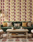 Velvet Orchid romantic burgundy and gold floral wallpaper in a warm and inviting living room