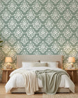 Verdant Damask elegant green damask wallpaper adding character to a cozy bedroom