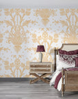 Gold Victorian Petal Dream damask wallpaper with ornate floral motifs in elegant bedroom setting