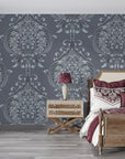 Gray and silver damask Vintage Eden wallpaper on bedroom accent wall with ornate floral medallions