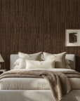 Warm Earth textured brown vertical wallpaper adding character to a cozy bedroom