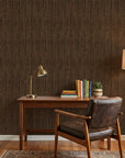 Warm Earth textured brown vertical wallpaper as a feature wall in a bright home office