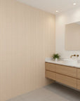 Warm Ticking cozy tan ticking stripe wallpaper creating ambiance in a serene bathroom