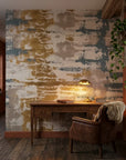 Weathered Gold distressed abstract brushstroke wallpaper adding character to a cozy bedroom