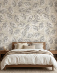 Weathered Grove neutral botanical peel and stick wallpaper adding character to a cozy bedroom