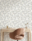 Weathered Grove neutral botanical peel and stick wallpaper as a feature wall in a bright home office