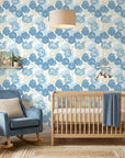 Wide Open Sky blue floral peel and stick wallpaper as a feature wall in a bright home office