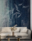 Ombré blue to cream Willow Branches wallpaper with delicate botanical motifs in modern living room
