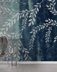 Willow Branches removable wallpaper in teal and navy ombre with botanical leaf motifs on modern living room wall