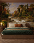 Woodland Haven landscape mural wallpaper with autumn forest and stream on bedroom accent wall