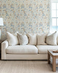 Seamless, neutral, and highly textured Worn Point custom wallpaper covering the wall surface