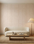 Woven Blush blush herringbone line wallpaper in a warm and inviting living room