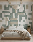 Woven Patchwork sage green geometric adding character to a cozy bedroom