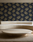 Acacia Scatter Black Gold dainty leaf wallpaper in an elegant living room