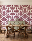 Antique Fern Mist Garnet distressed damask wallpaper in a farmhouse dining room with a sage sideboard and rustic trestle table
