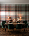 Autumn Lattice Ivory plaid wallpaper in a dark moody dining room with a candlelit table