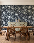 Blueprint Bloom Charcoal floral line wallpaper in a farmhouse dining room with a sage sideboard and rustic trestle table