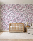 Blush Serenade Aubergine floral damask wallpaper in a calm, light-filled nursery