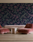 Blush Serenade Midnight floral damask wallpaper in a boutique hotel sitting area