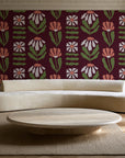 Bohemian Daisy Oxblood retro floral wallpaper in an elegant living room