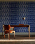 Canyon Ikat Indigo geometric wallpaper as a feature wall in a home study