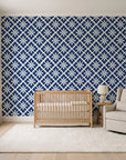 Carbon Bloom Navy tile floral wallpaper in a calm, light-filled nursery
