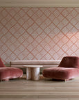 Chevron Etch Clay geometric diamond wallpaper in a boutique hotel sitting area