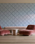 Chevron Etch Pewter geometric diamond wallpaper in a boutique hotel sitting area