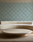 Chevron Etch Sage geometric diamond wallpaper in an elegant living room