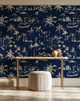 Coastal Village Midnight palm toile wallpaper on the wall of a grand entry foyer