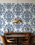 Dreamy Fern Dial Slate fern damask wallpaper behind a walnut credenza and round table in an elegant dining room