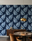 Driftwood Fern Midnight fern frond wallpaper in an elegant dining room