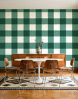 Dune Plaid Emerald gingham check wallpaper in a mid-century dining room with a teak sideboard and tulip table