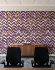 Dusk Passage Plum chevron wallpaper above a walnut credenza in a modern conference room